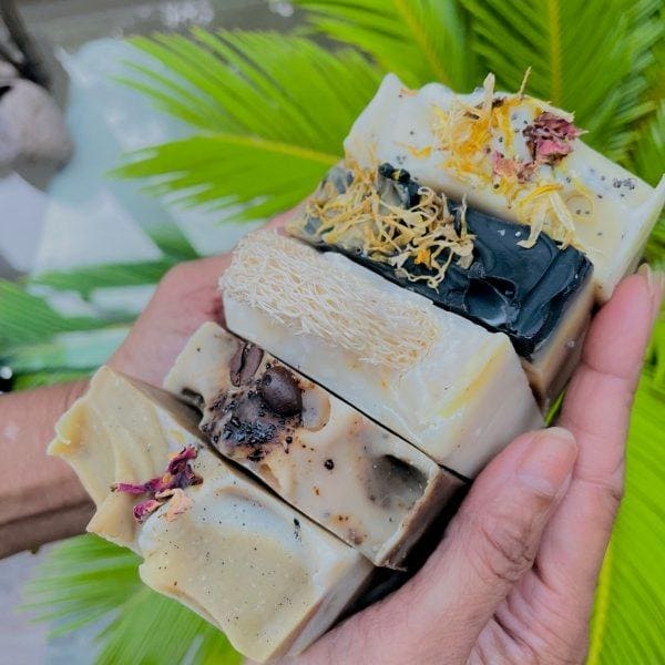 2 Soaps with a wooden soap dish