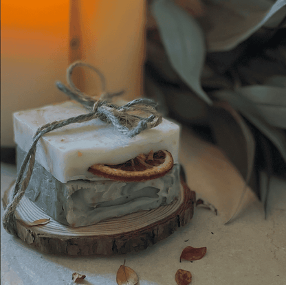 2 Soaps with a wooden soap dish